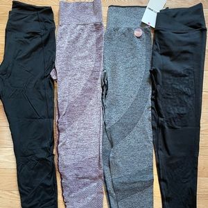 Four Large PINK/VS Never Worn Leggings!